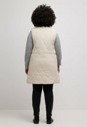 Длинный жилет