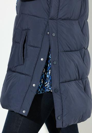 Длинный жилет