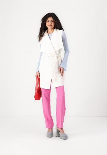 Длинный жилет