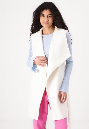 Длинный жилет