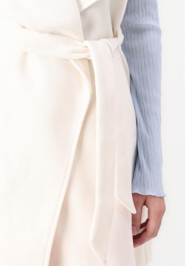 Длинный жилет