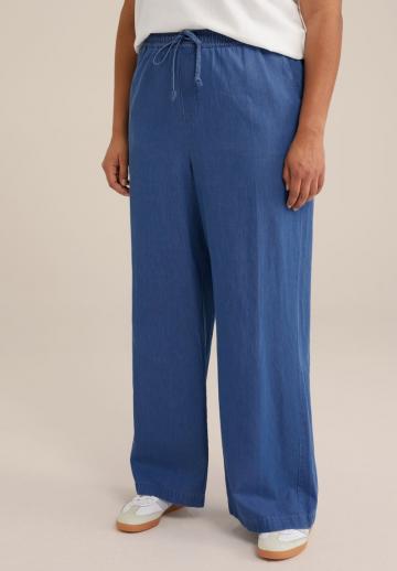 Клешеные джинсы