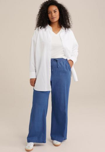 Клешеные джинсы