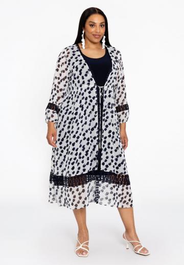 Длинный жилет