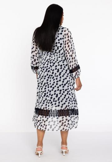 Длинный жилет