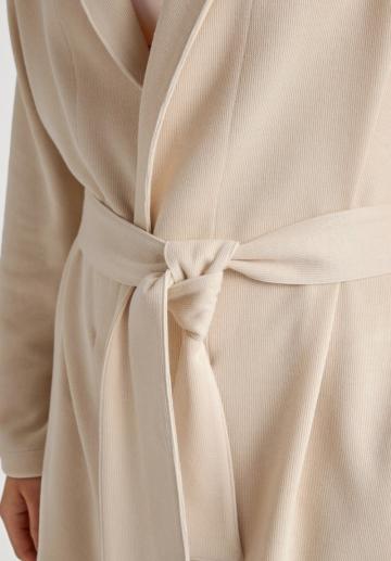 Длинный жилет