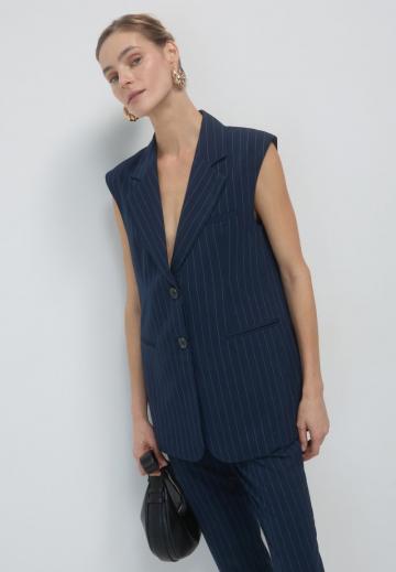 Длинный жилет