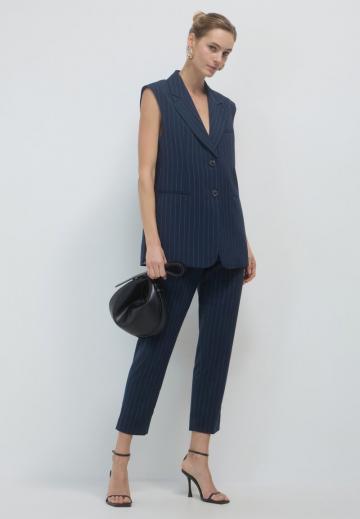 Длинный жилет