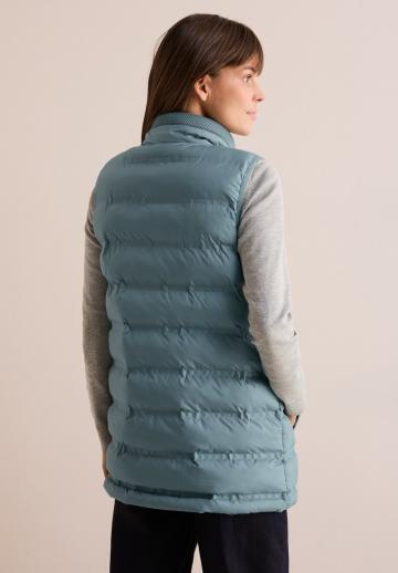 Длинный жилет