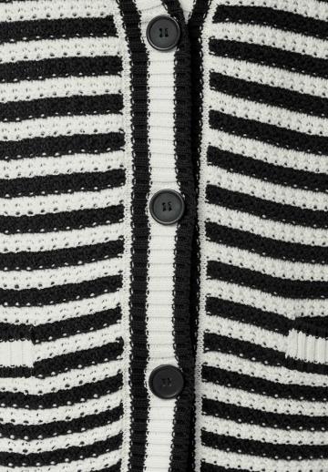 Длинный жилет