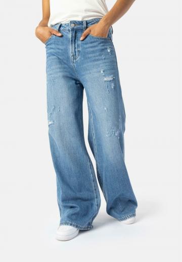 Клешеные джинсы