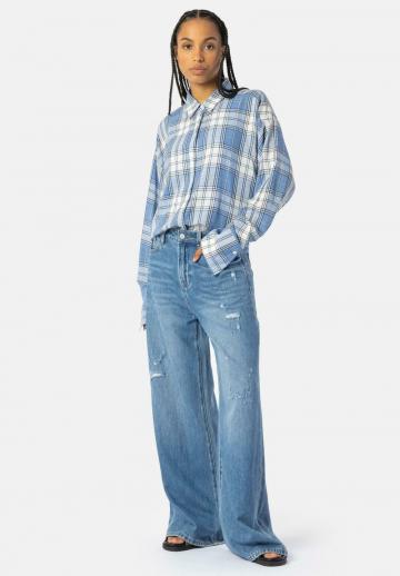 Клешеные джинсы