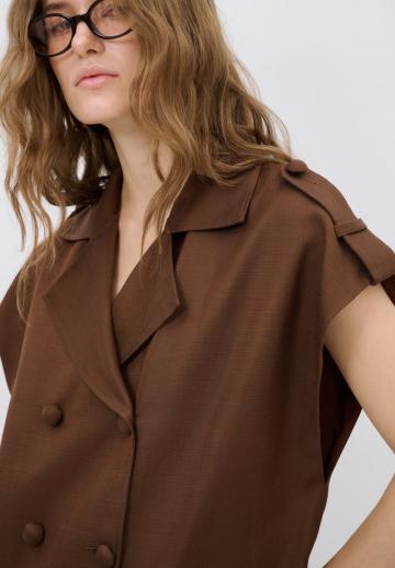 Длинный жилет