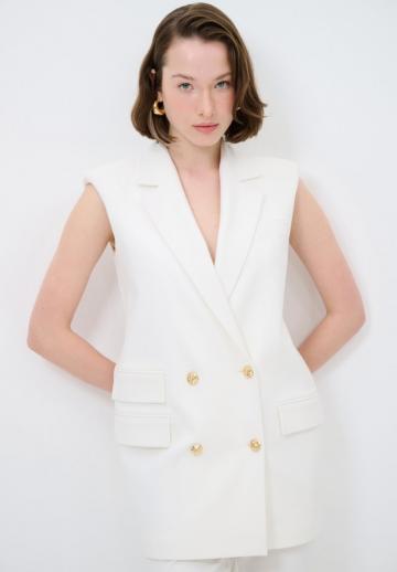 Длинный жилет