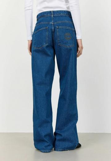 Клешеные джинсы