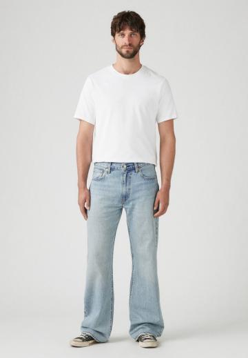 Клешеные джинсы