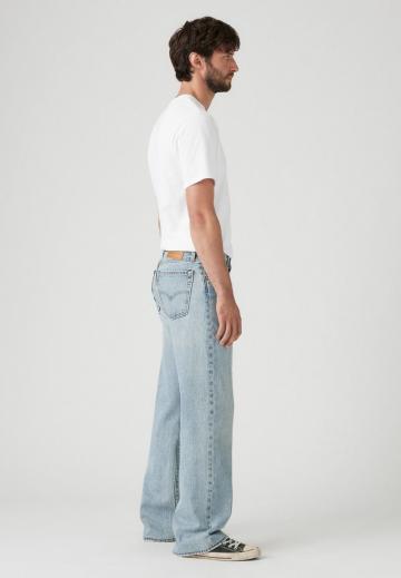 Клешеные джинсы