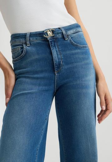 Клешеные джинсы