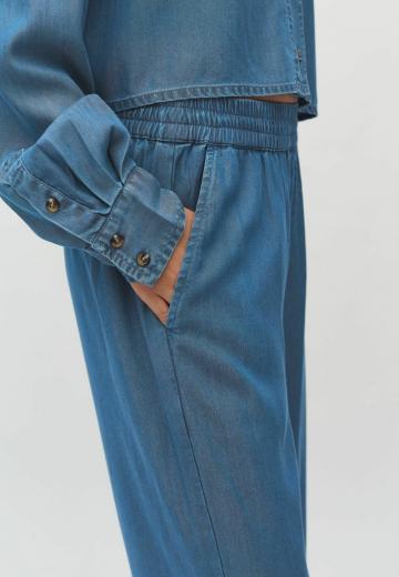 Клешеные джинсы