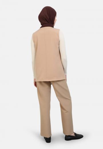 Длинный жилет