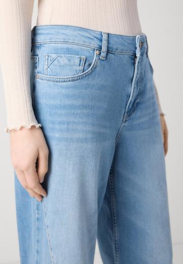 Клешеные джинсы