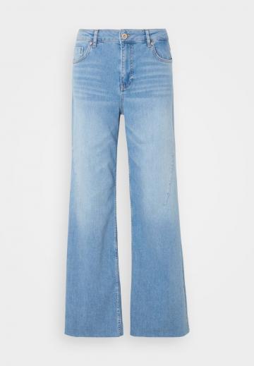 Клешеные джинсы