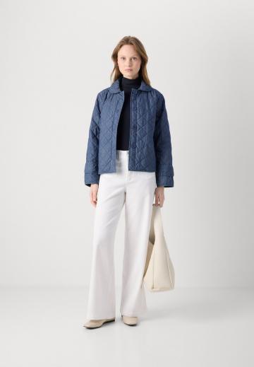 Клешеные джинсы