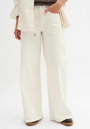 Клешеные джинсы