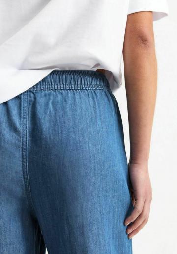 Клешеные джинсы