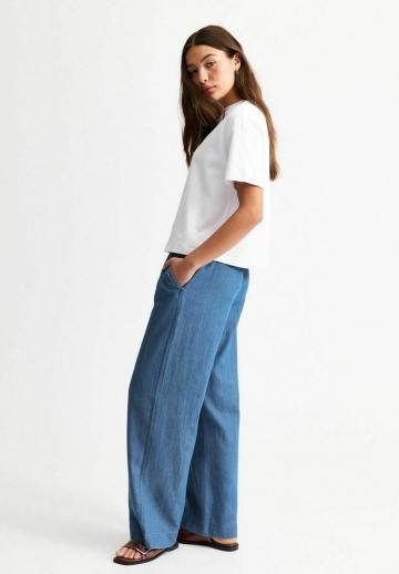 Клешеные джинсы