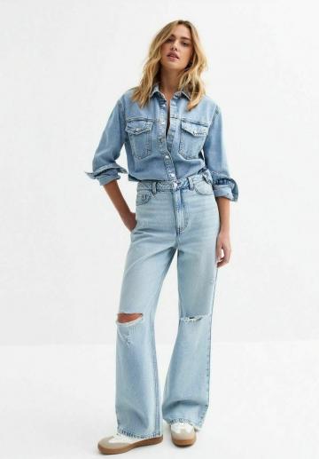 Клешеные джинсы