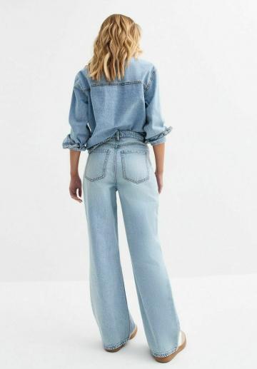 Клешеные джинсы