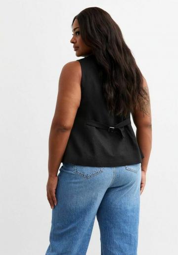 Джинсовая жилетка