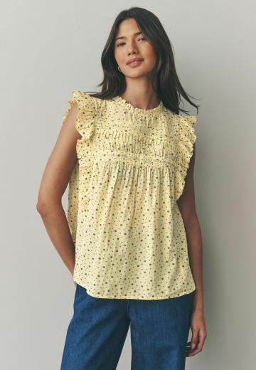 Блузка без рукавов