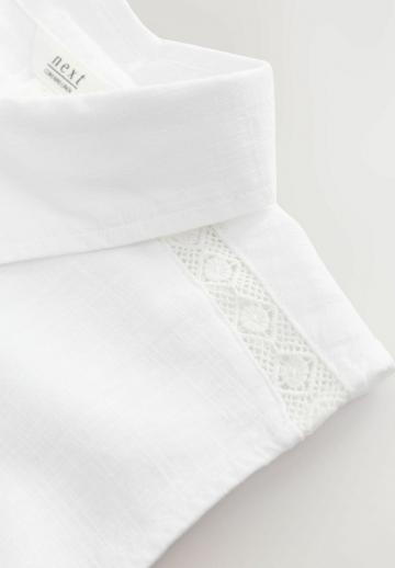 Блузка без рукавов