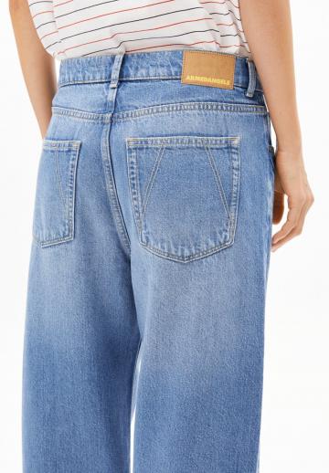 Клешеные джинсы