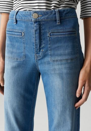 Клешеные джинсы