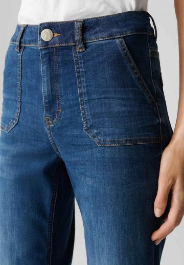 Клешеные джинсы