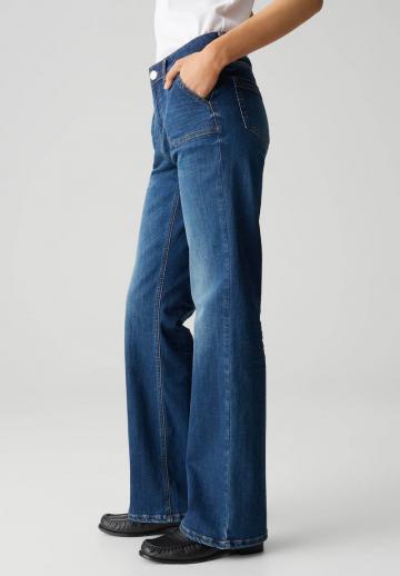Клешеные джинсы
