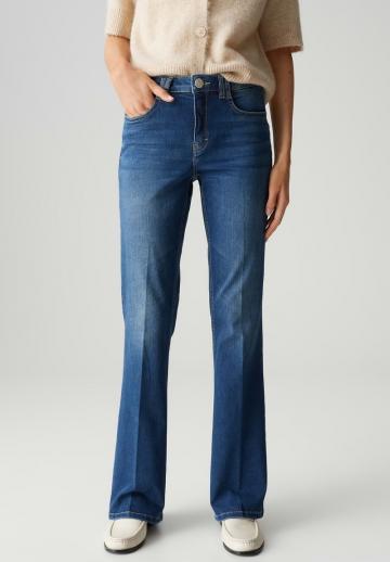 Клешеные джинсы