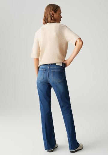 Клешеные джинсы