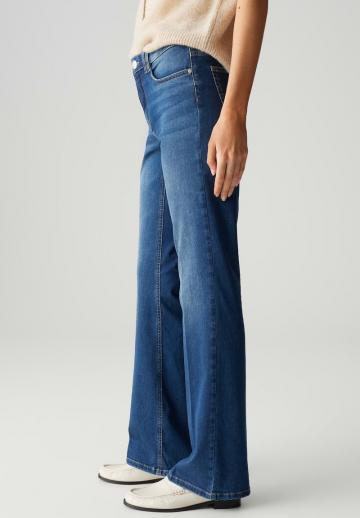 Клешеные джинсы