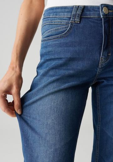 Клешеные джинсы
