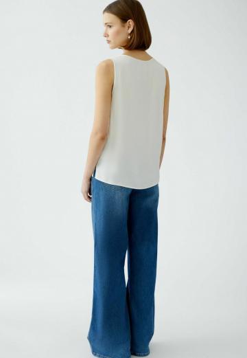 Блузка без рукавов