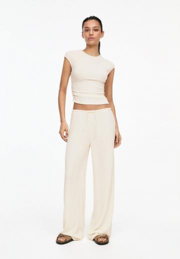 Блузка без рукавов