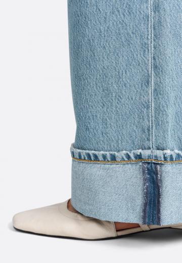 Клешеные джинсы