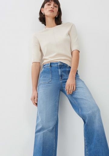 Клешеные джинсы