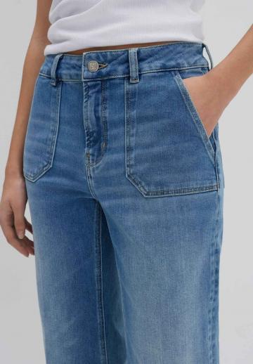 Клешеные джинсы