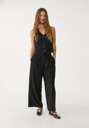 Джинсовая жилетка