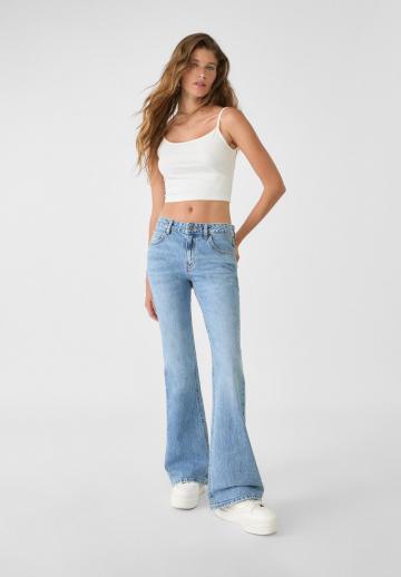 Клешеные джинсы